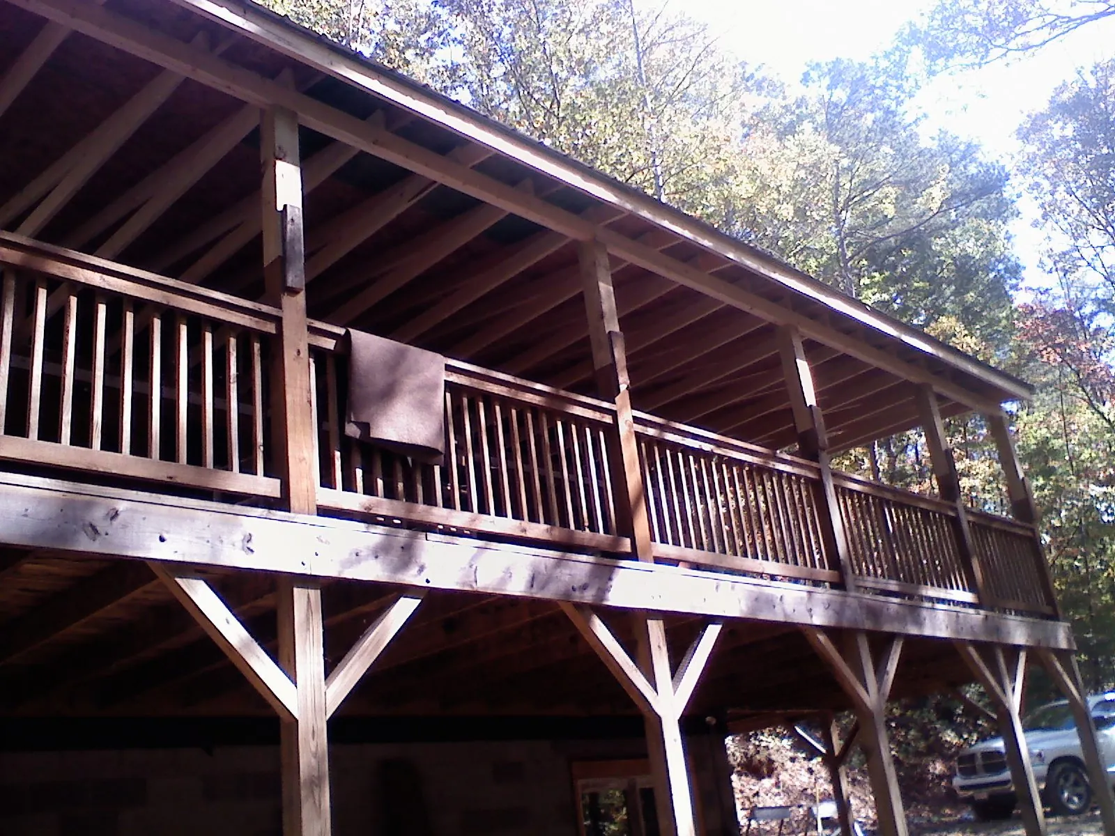 Timber framing under a new elevated porch and deck — Roof Leak Repair in Paxico by Roofing Brothers